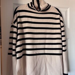 Elegant Striped Turtleneck Sweater in Black and Cream